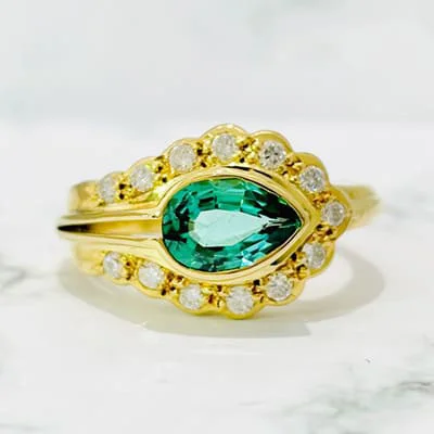 We bought Nhẫn Tourmaline Xanh Lá K18YG